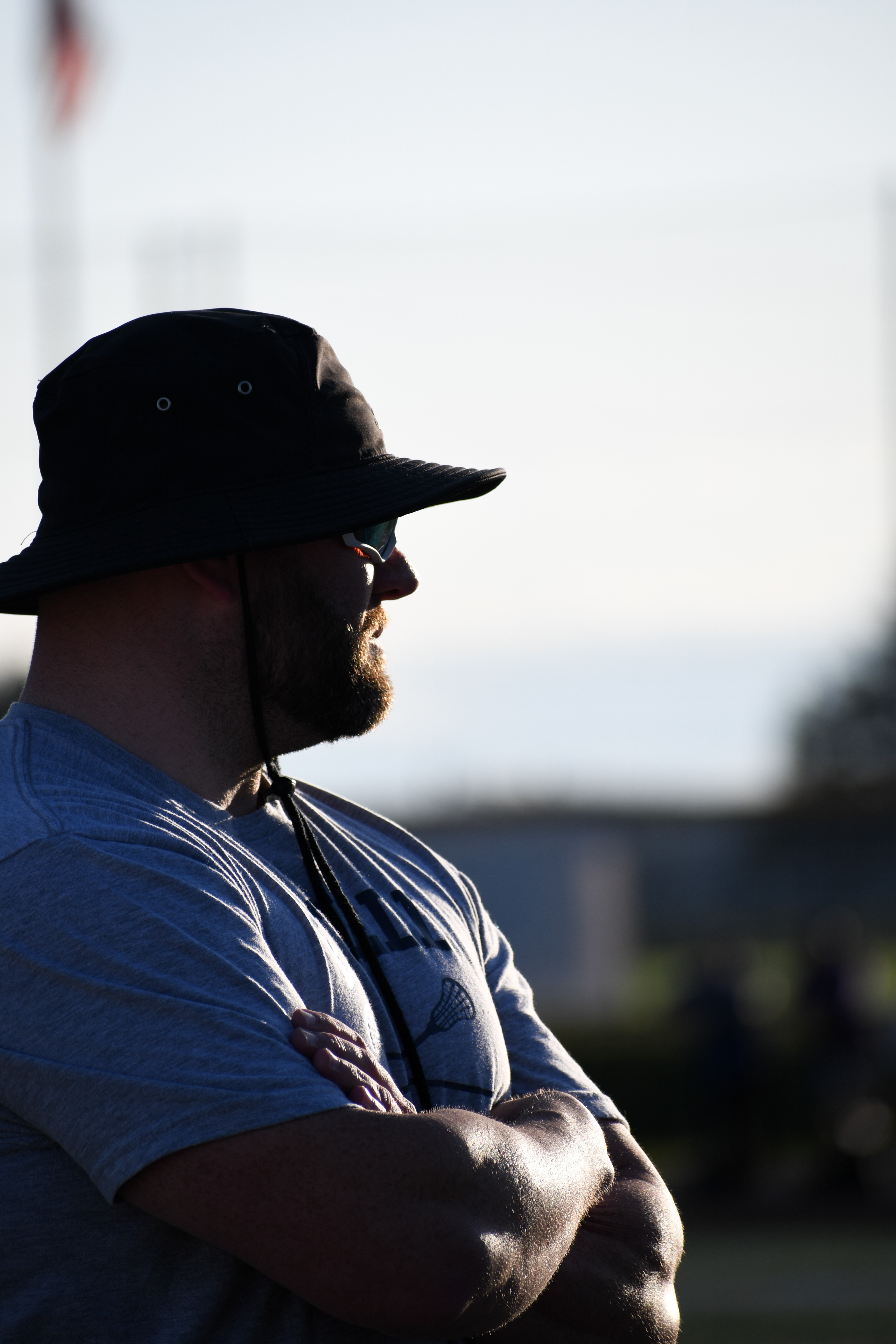 Coach Derek Carlile on the field